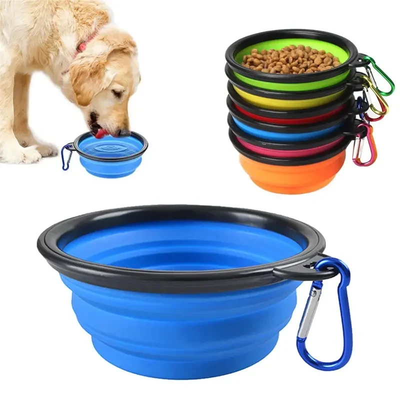 Collapsible dog bowls with carabiners in various colors.