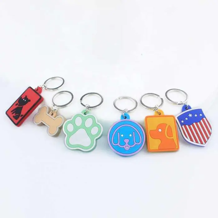 Colorful pet-themed keychains on display.