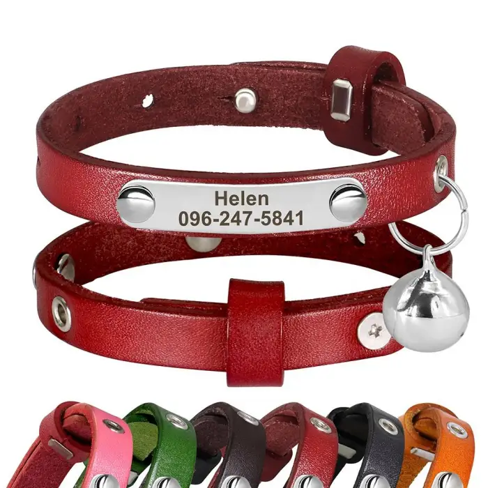 Leather pet collars with tags and bell.