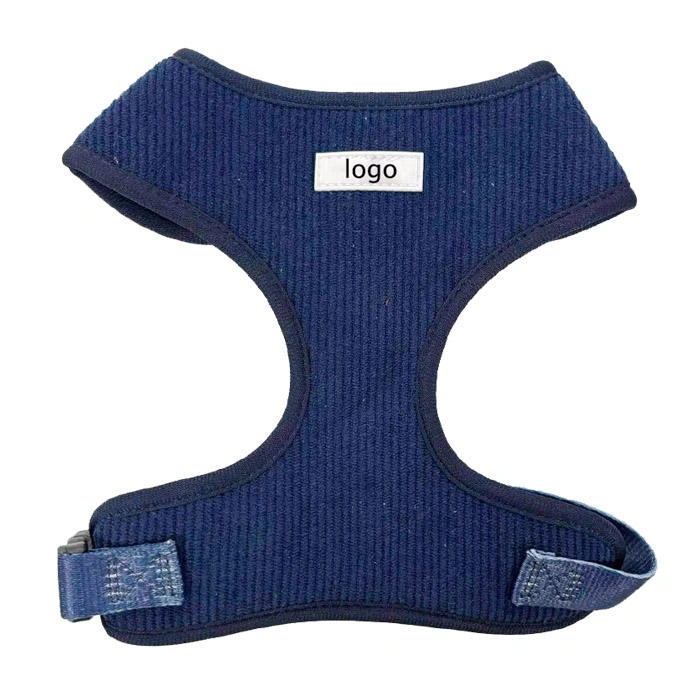 Blue dog harness with adjustable straps.