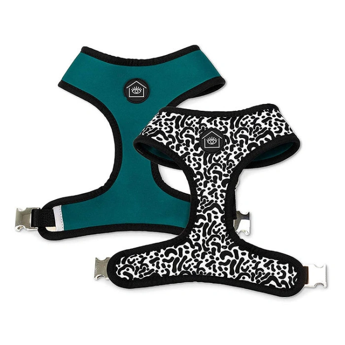 Two stylish dog harnesses, teal and black-white.